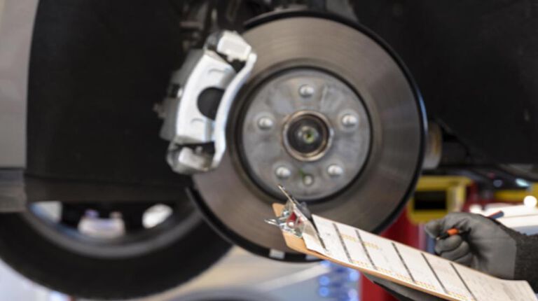 Kal Tire brake check - inspection from on clipboard